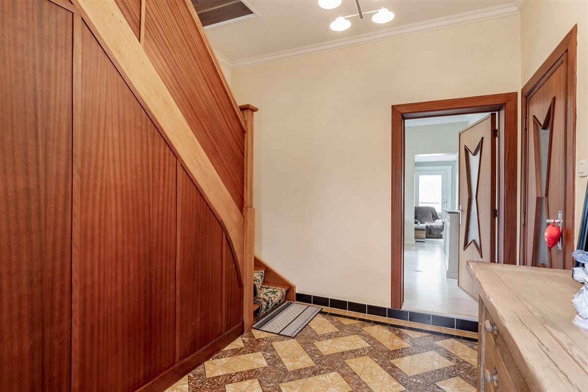 Charmante woning met prachtige tuin van bijna 7 are