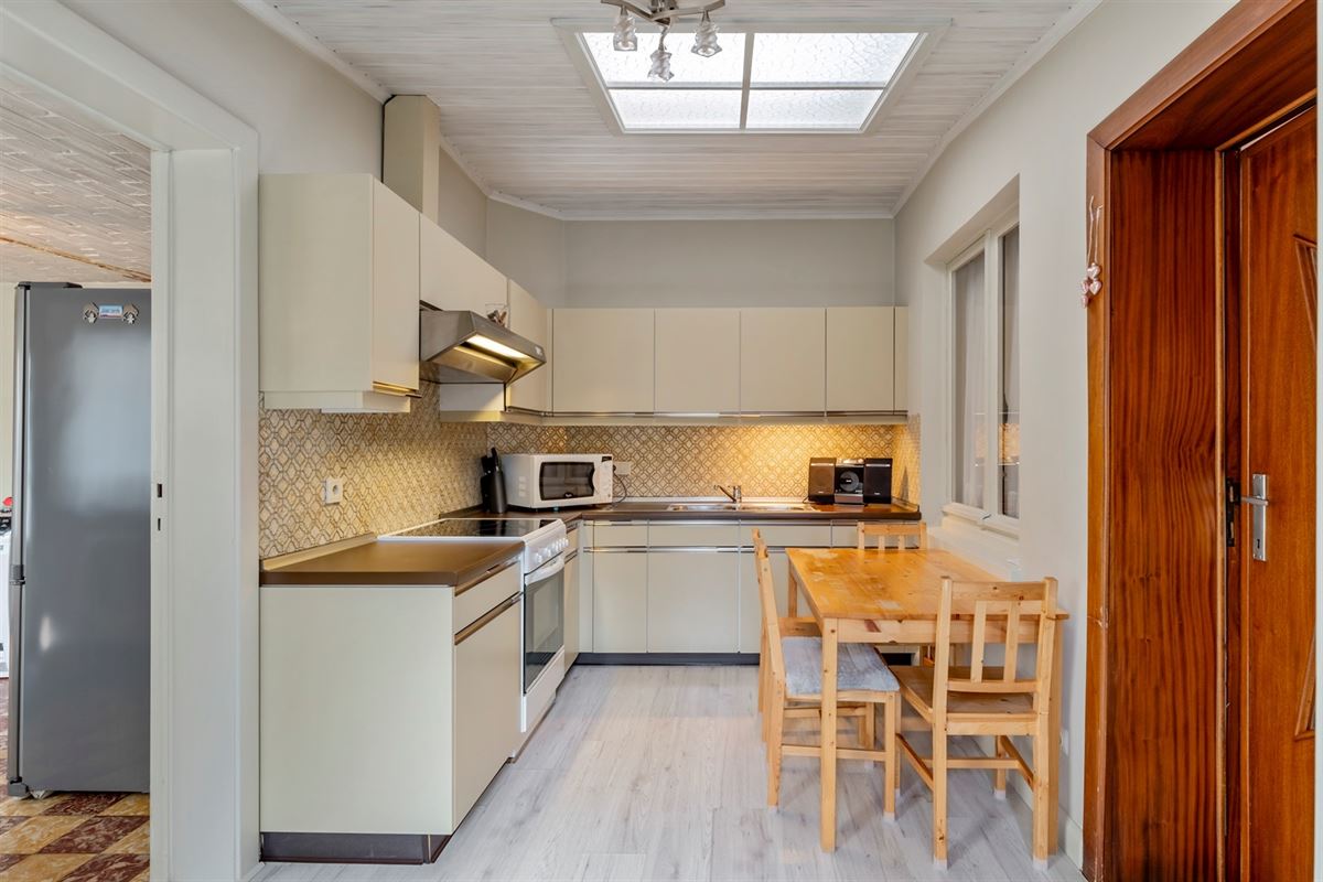 Charmante woning met prachtige tuin van bijna 7 are