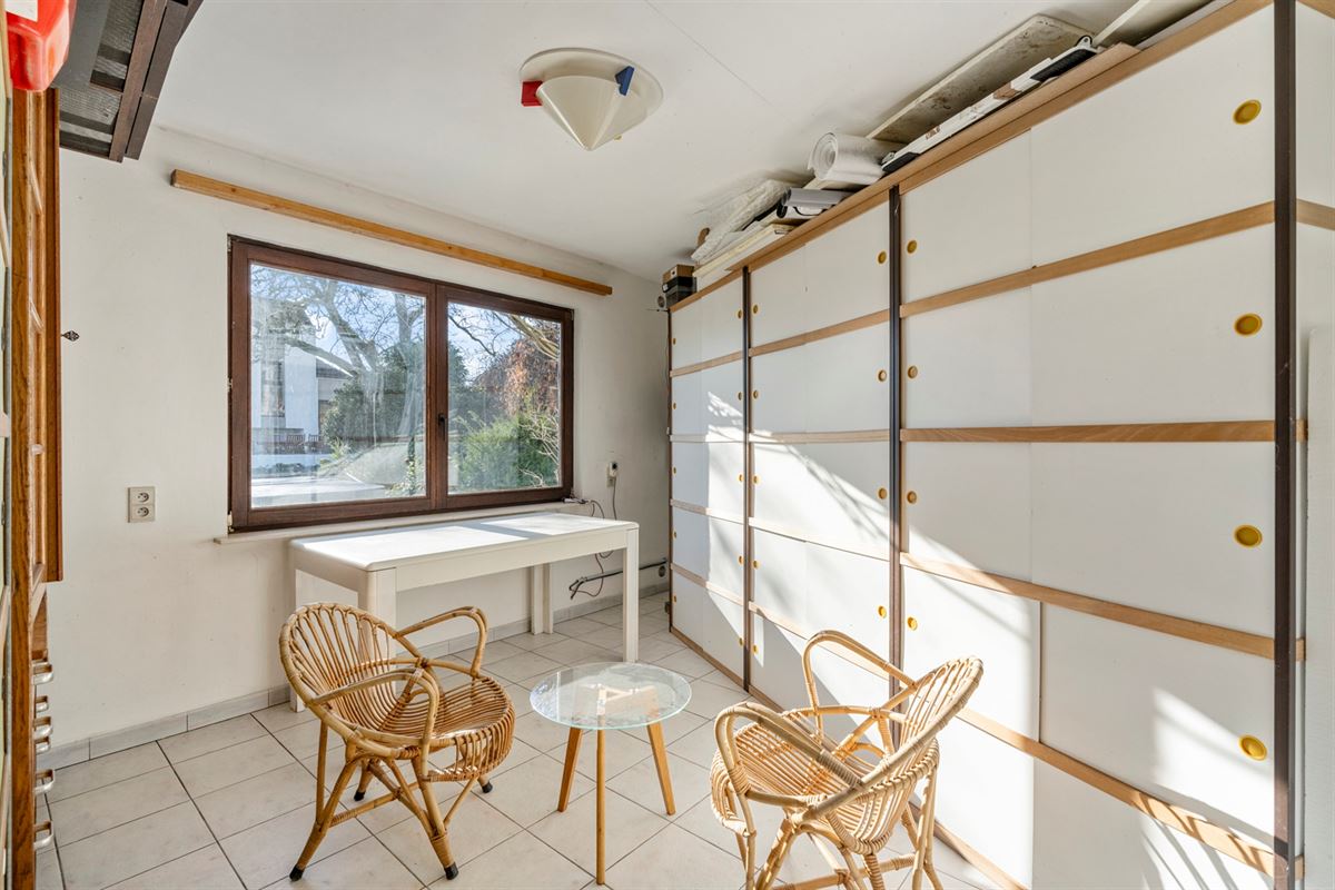 Huis met 4 slaapkamers en garage/atelier in de tuin