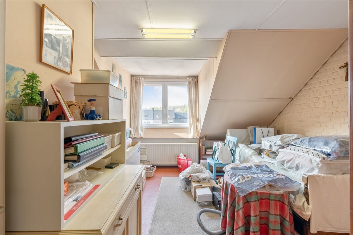 Huis halfopen bebouwing met tuin en garage