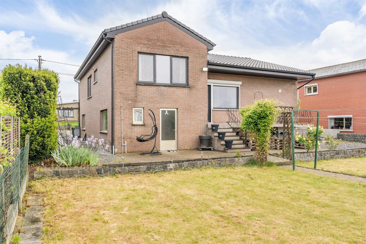 Rustig gelegen gerenoveerde woning volledig onderkelderd met ruime tuin