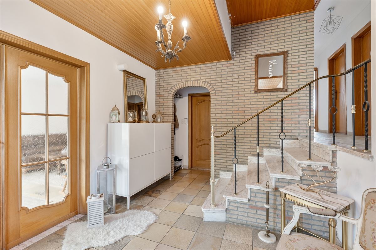 Rustig gelegen gerenoveerde woning volledig onderkelderd met ruime tuin