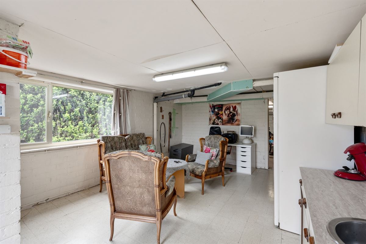 Rustig gelegen gerenoveerde woning volledig onderkelderd met ruime tuin