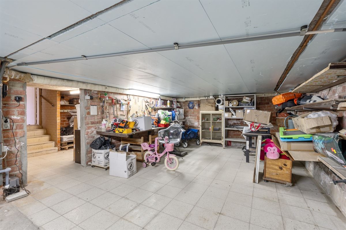 Rustig gelegen gerenoveerde woning volledig onderkelderd met ruime tuin