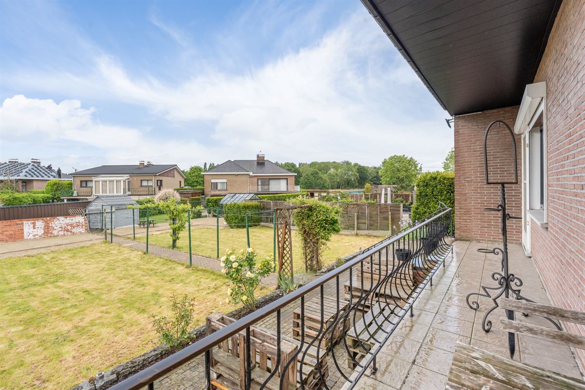 Rustig gelegen gerenoveerde woning volledig onderkelderd met ruime tuin