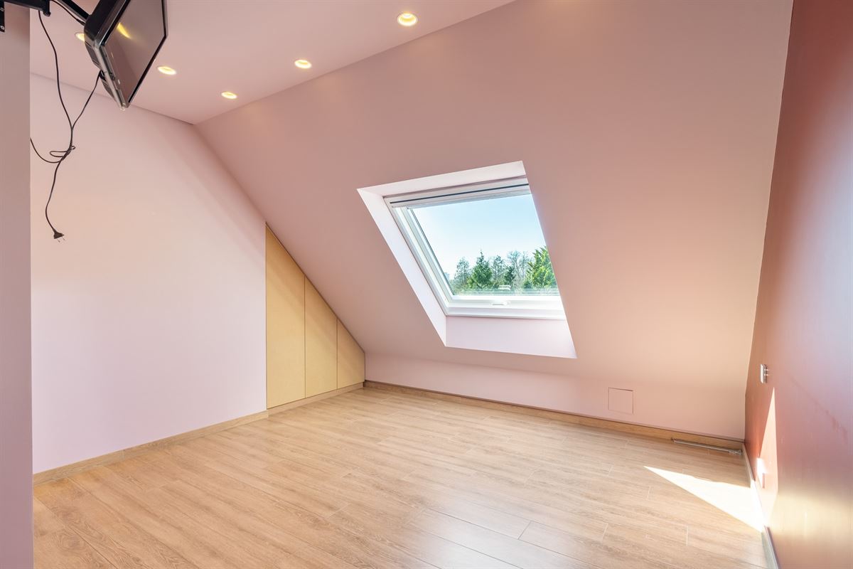 Luxeappartement met zicht op park met tennisveld