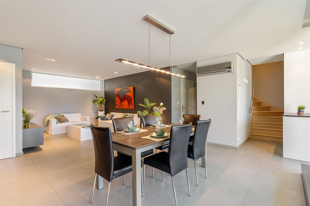 Luxeappartement met zicht op park met tennisveld