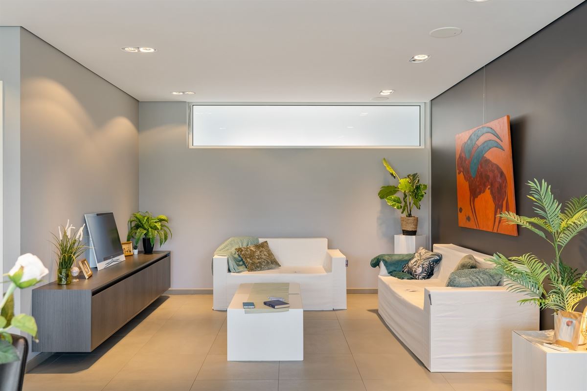 Luxeappartement met zicht op park met tennisveld