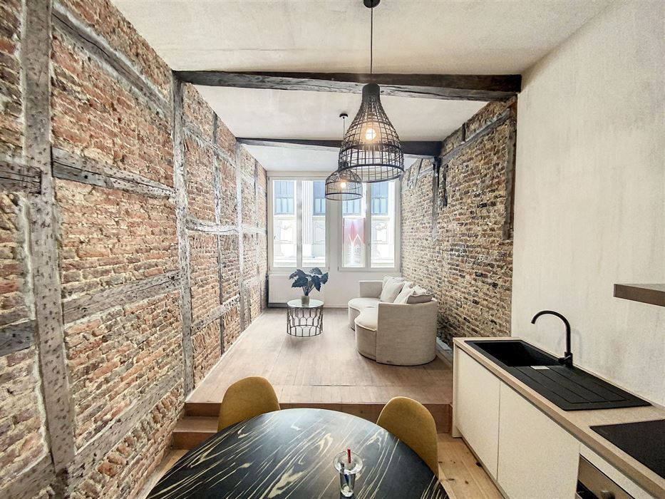 Immeuble mixte habitat./rez commercial