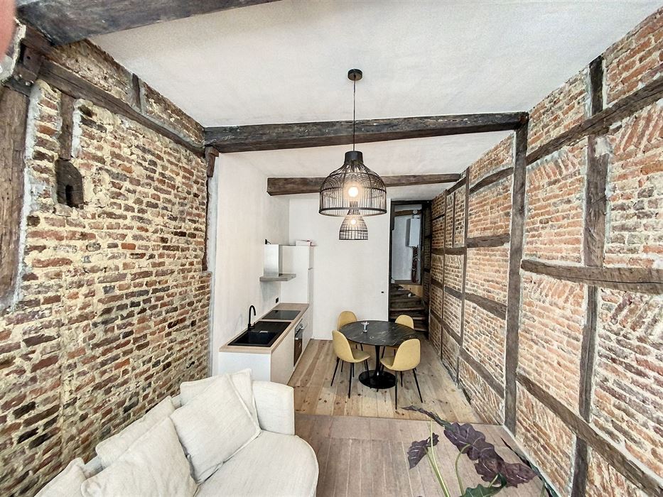 Immeuble mixte habitat./rez commercial
