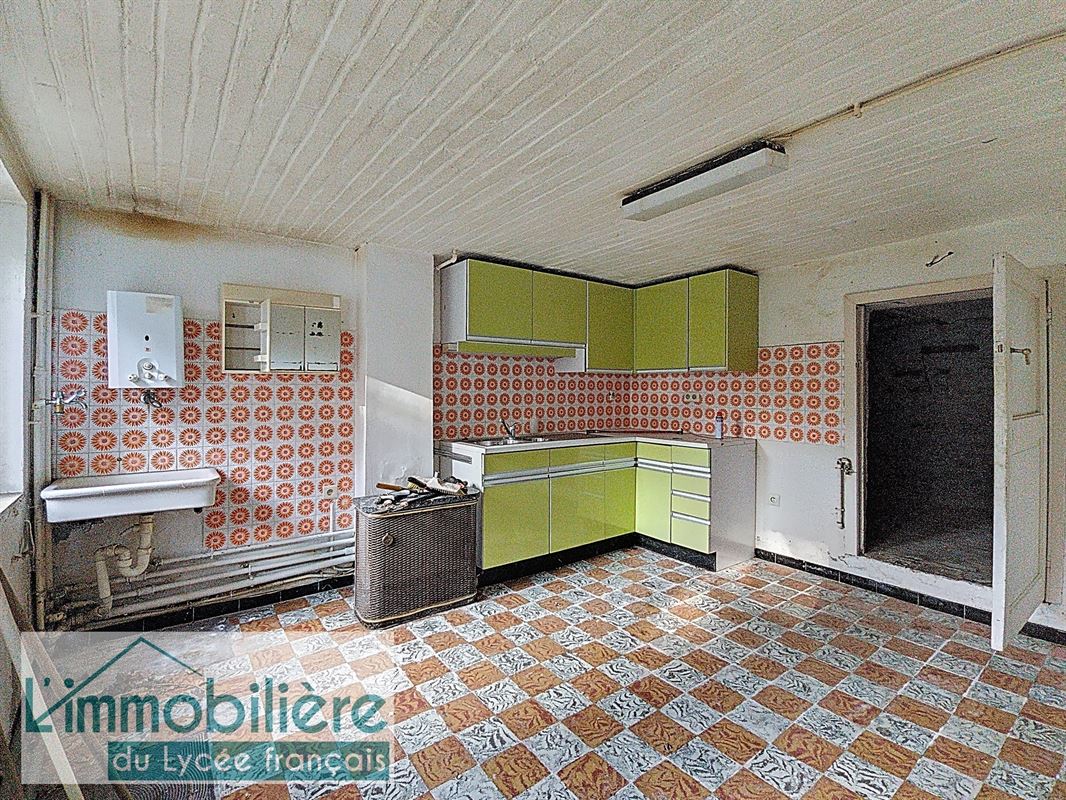 Maison avec garage et jardin à rénover, fort potentiel
