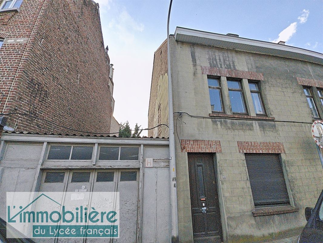Maison avec garage et jardin à rénover, fort potentiel