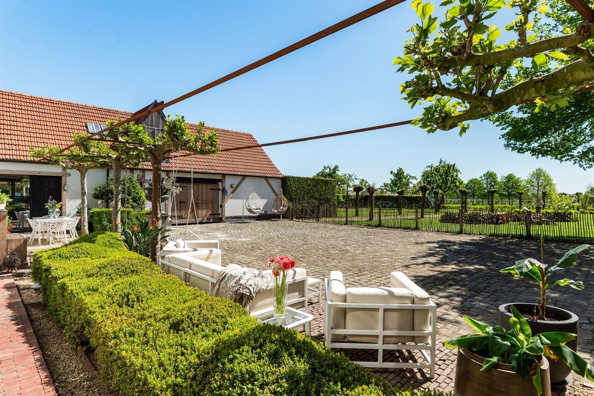 Unique, luxurious farmhouse with an indoor pool, spa, and golf course