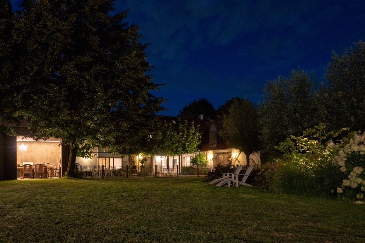 Unique, luxurious farmhouse with an indoor pool, spa, and golf course