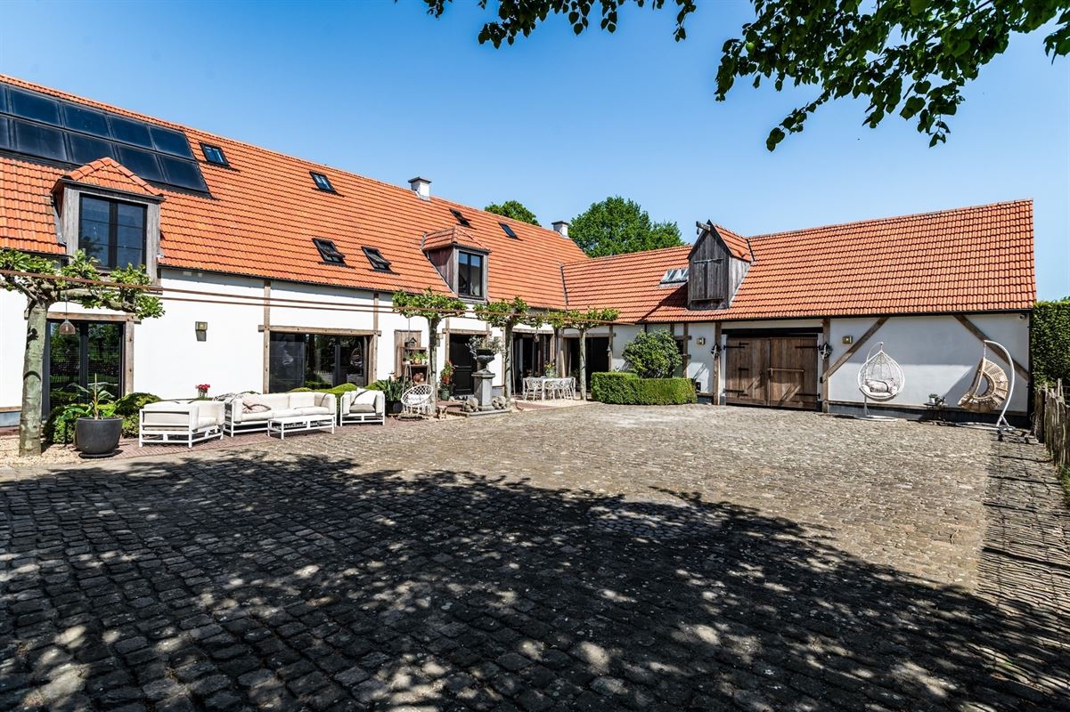 Unique, luxurious farmhouse with an indoor pool, spa, and golf course