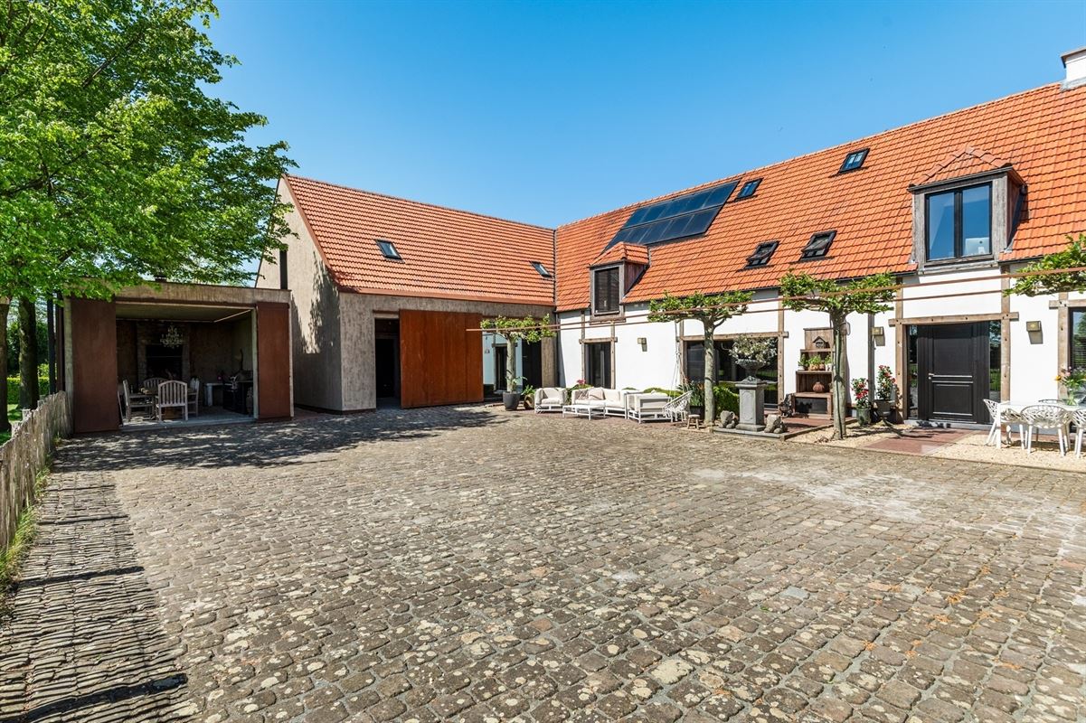 Unique, luxurious farmhouse with an indoor pool, spa, and golf course