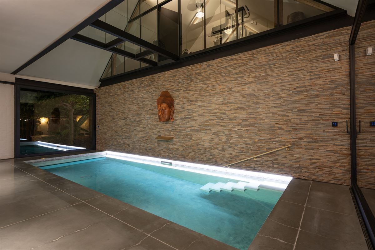 Unique, luxurious farmhouse with an indoor pool, spa, and golf course