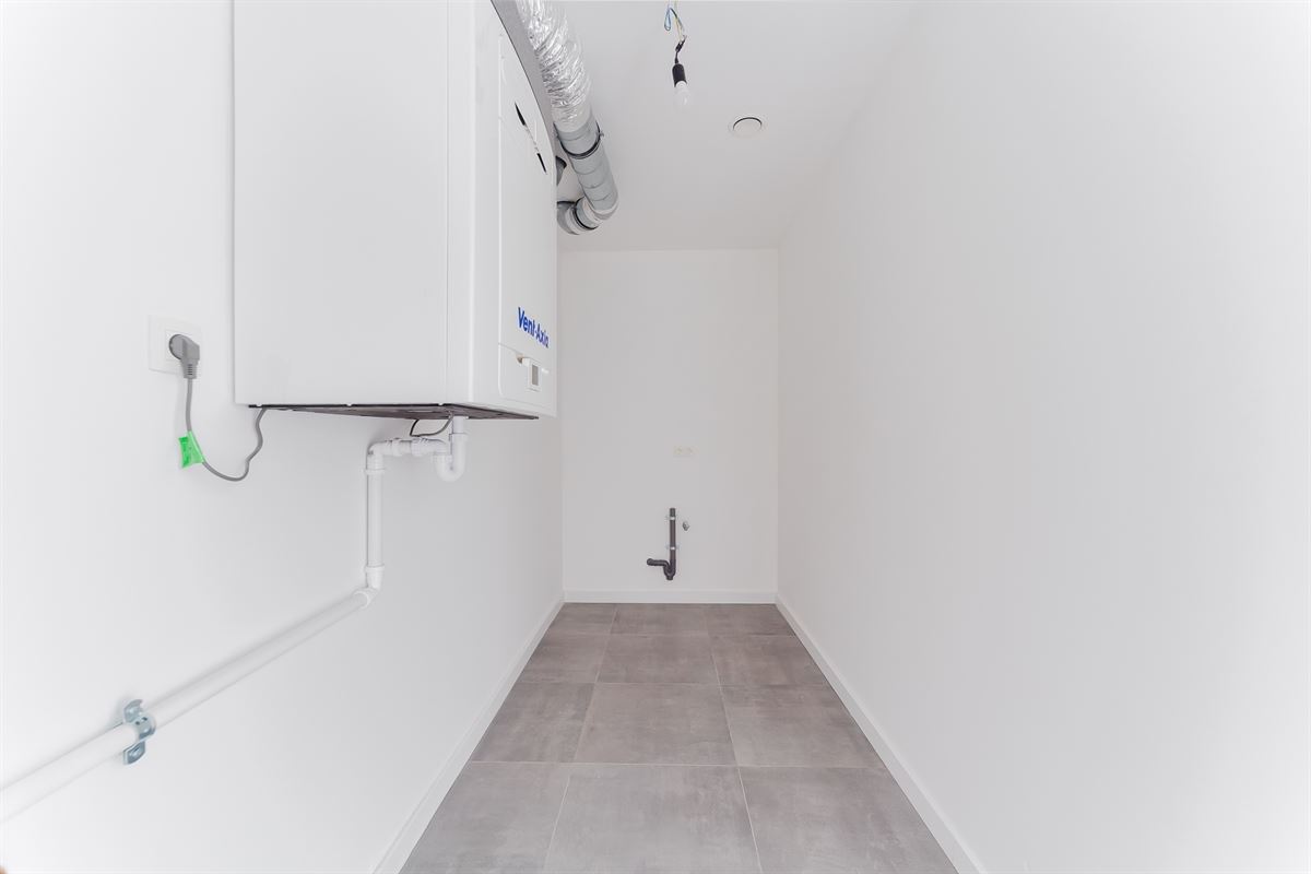 Nieuwbouw glvl appartement met tuin en P