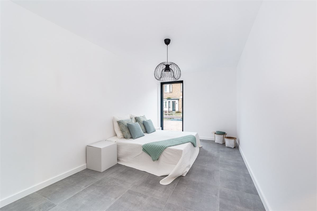 Nieuwbouw glvl appartement met tuin en P