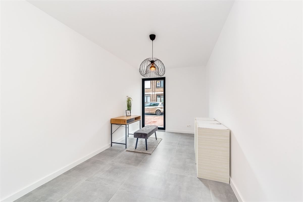 Nieuwbouw glvl appartement met tuin en P