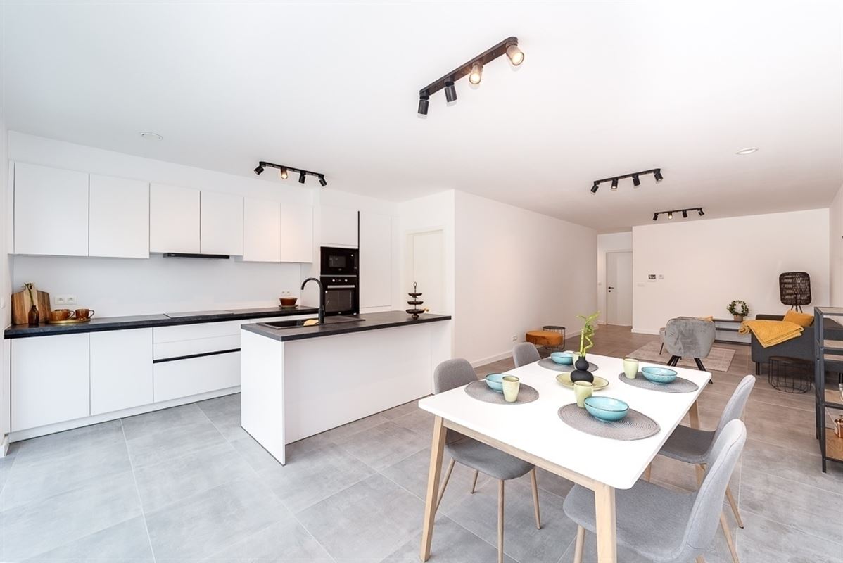 Nieuwbouw glvl appartement met tuin en P