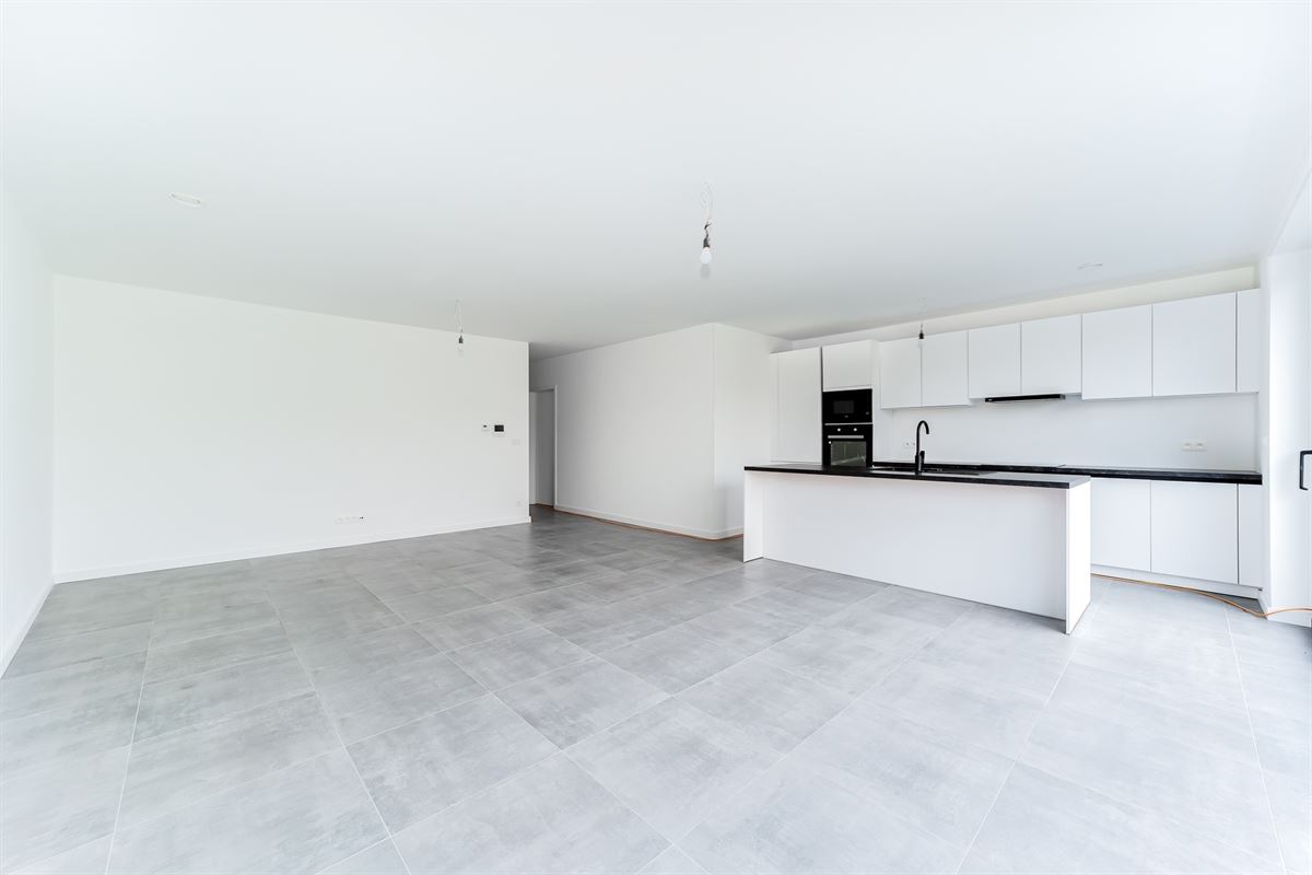 Nieuwbouw glvl appartement met tuin en P