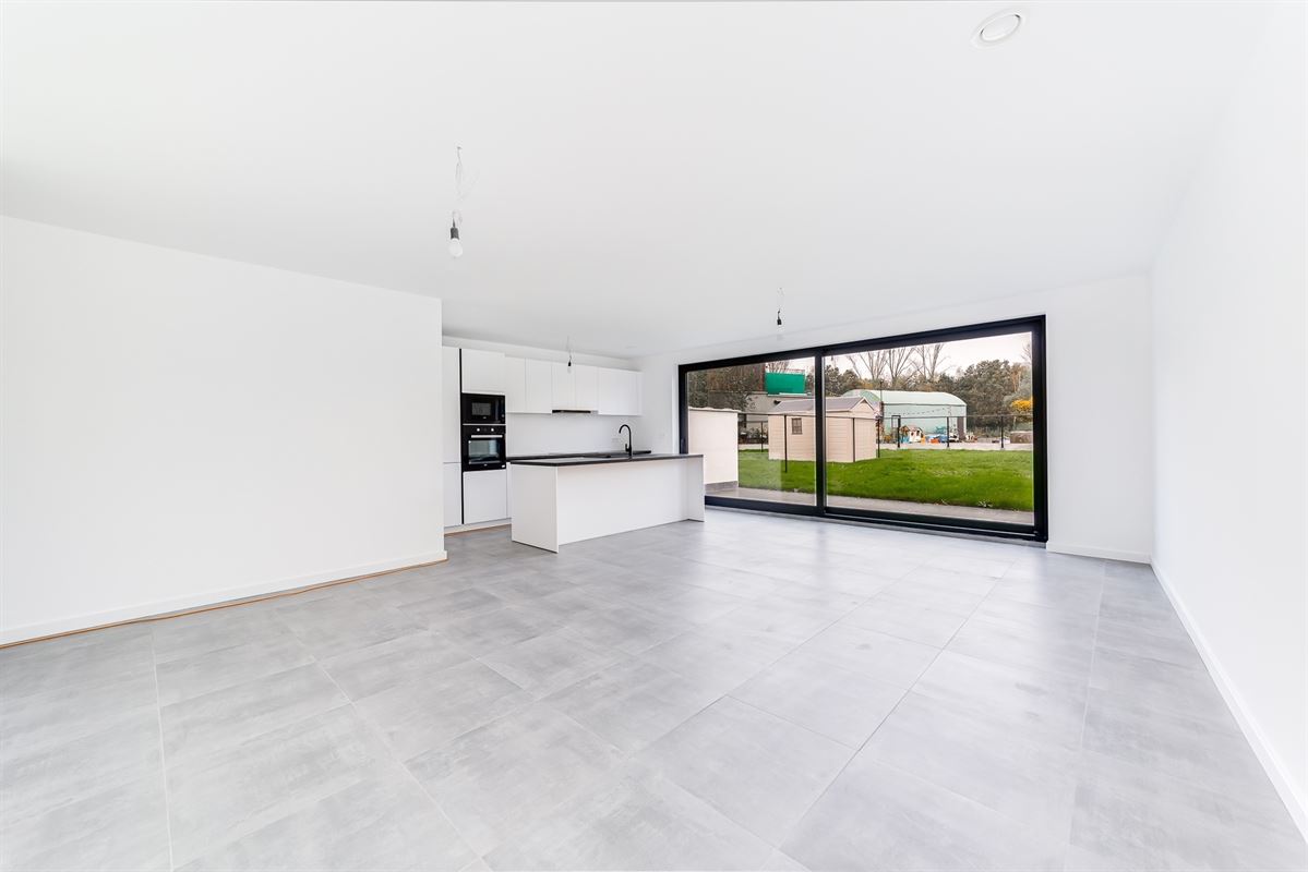 Nieuwbouw glvl appartement met tuin en P