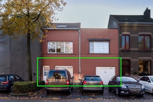 Gelijkvloers appartement met tuin en ruime garage