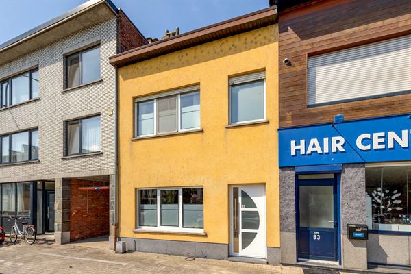 Gezinswoning met vier slaapkamers en tuin