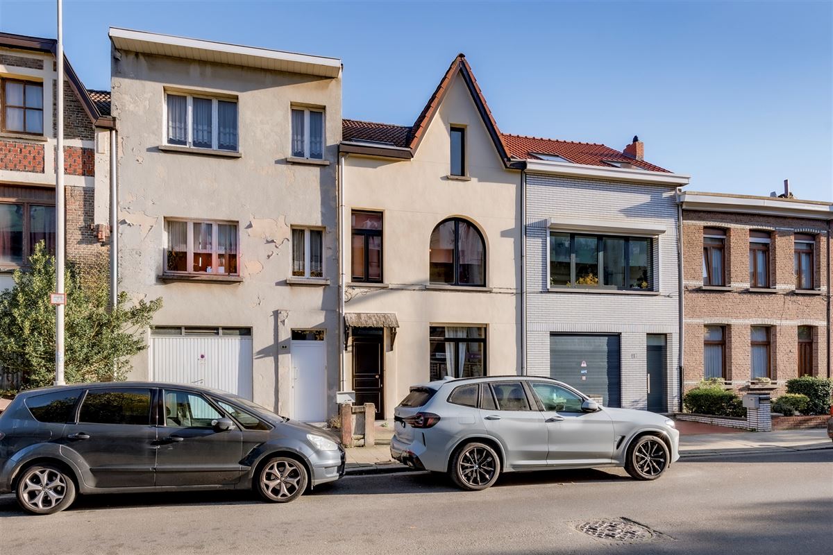 Huis met 4/5 slaapkamers en tuin