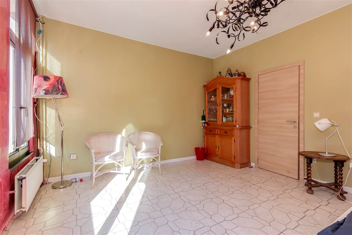 Huis met 4/5 slaapkamers en tuin