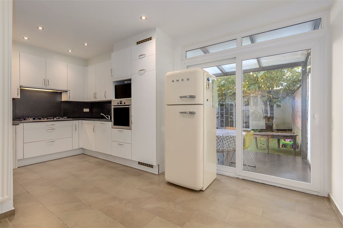 Huis met 4/5 slaapkamers en tuin