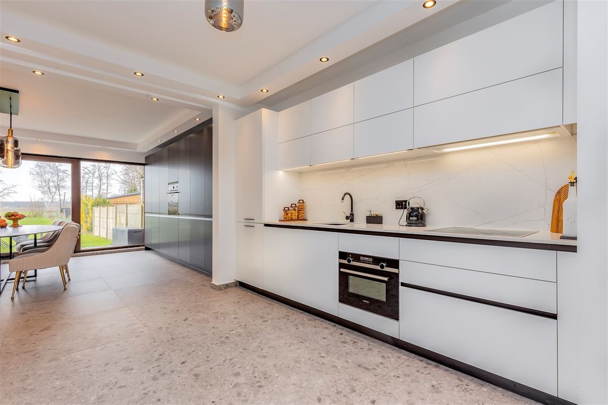 Stijlvolle gerenoveerde halfopen bebouwing met tuin en 3 slaapkamers in Oostmalle