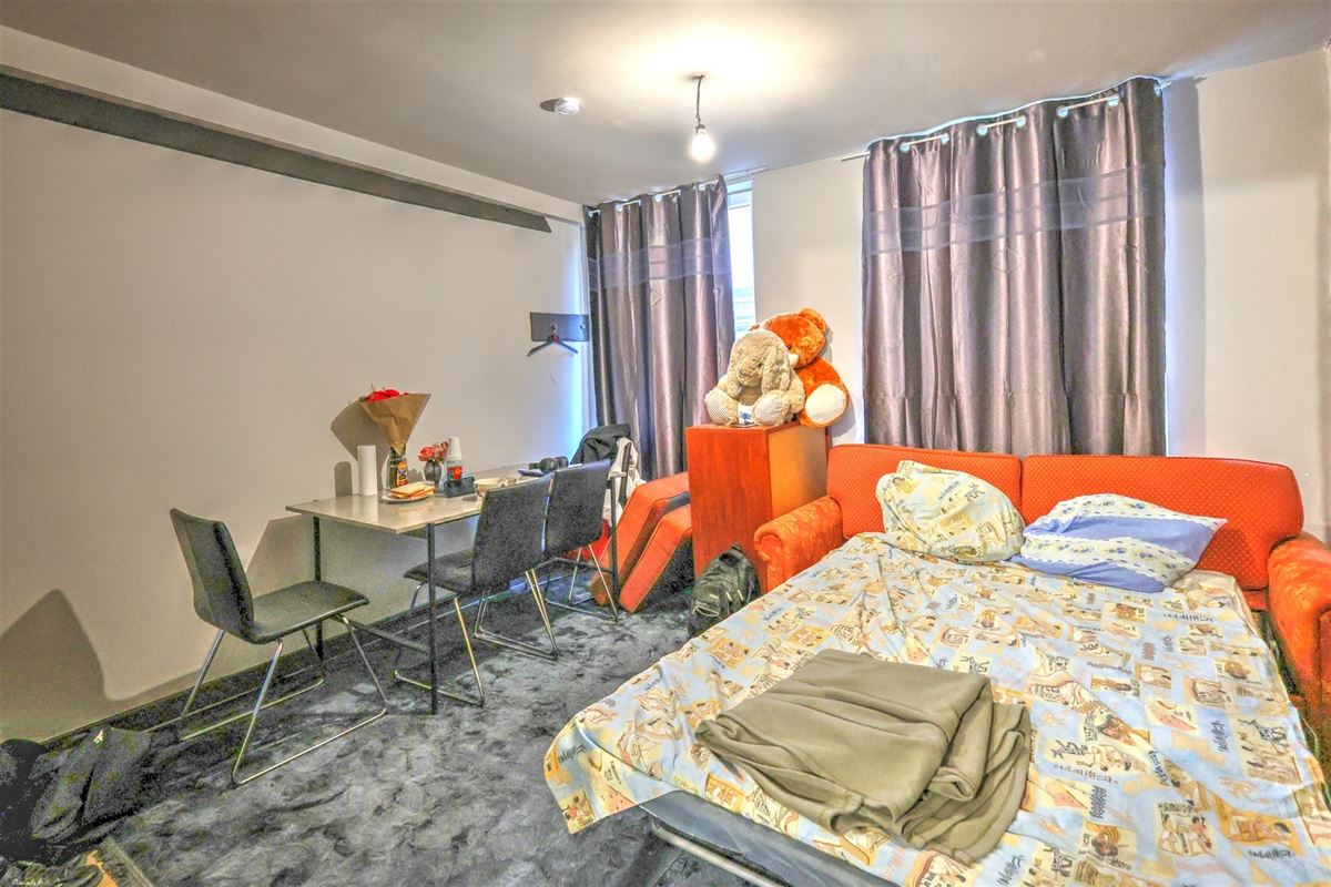 Opbrengsteigendom met 4 appartementen