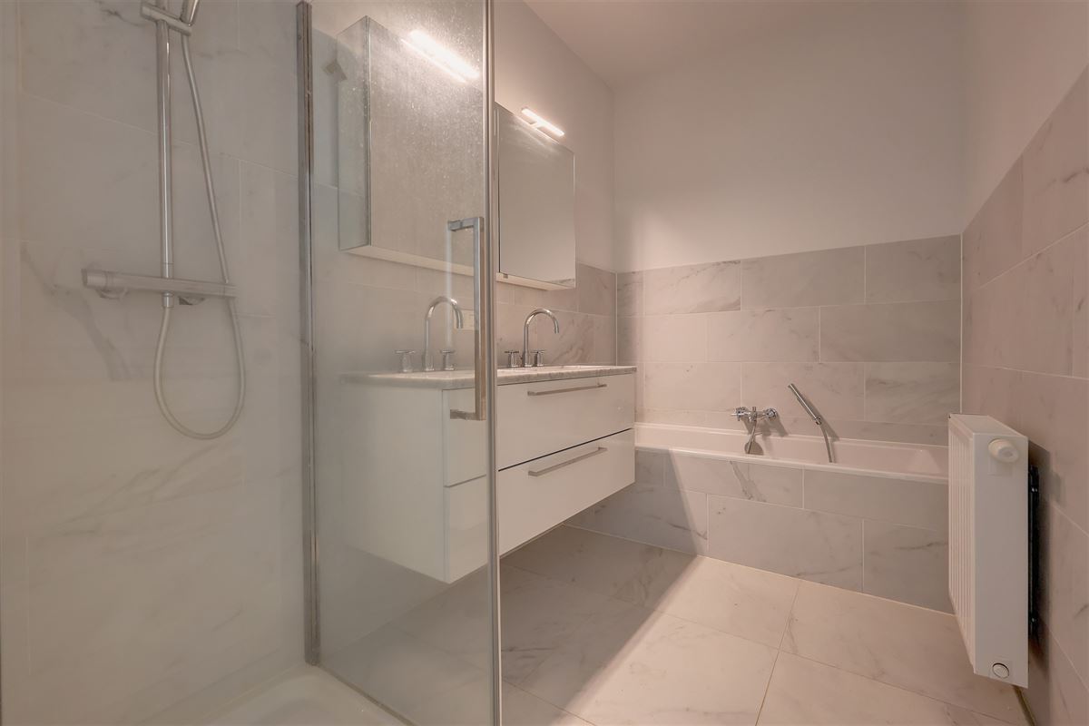 Lichtrijk appartement met 2 slaapkamers, staanplaats en gezellige tuin!