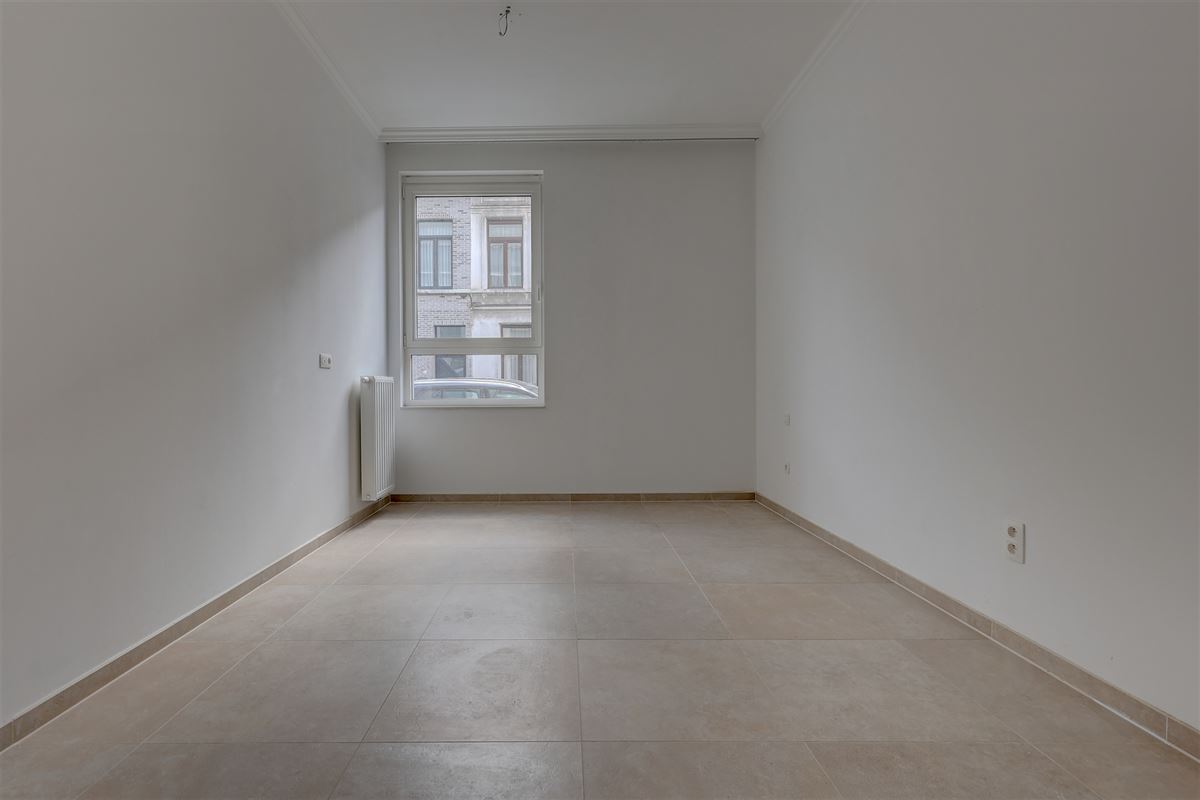 Lichtrijk appartement met 2 slaapkamers, staanplaats en gezellige tuin!