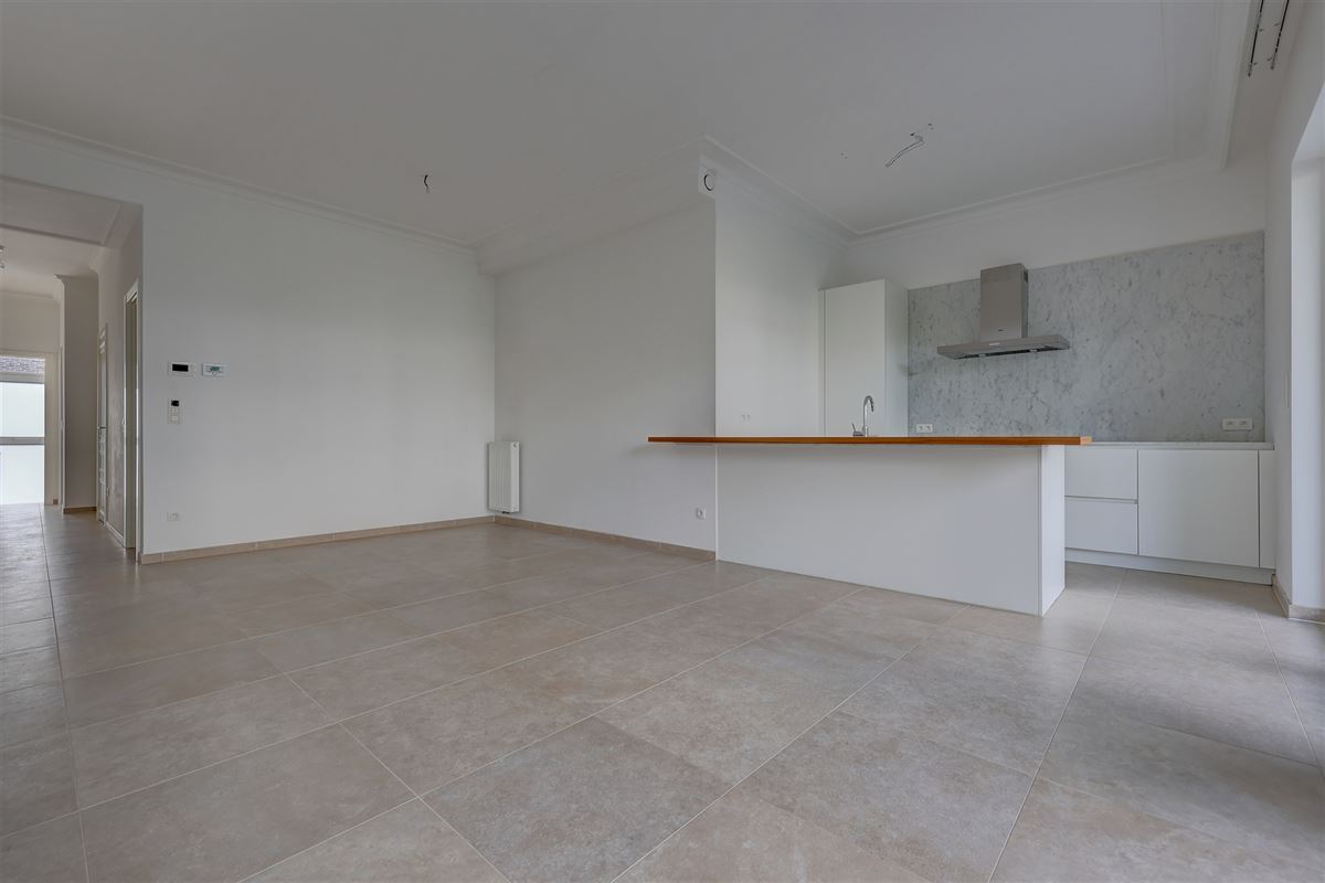 Lichtrijk appartement met 2 slaapkamers, staanplaats en gezellige tuin!