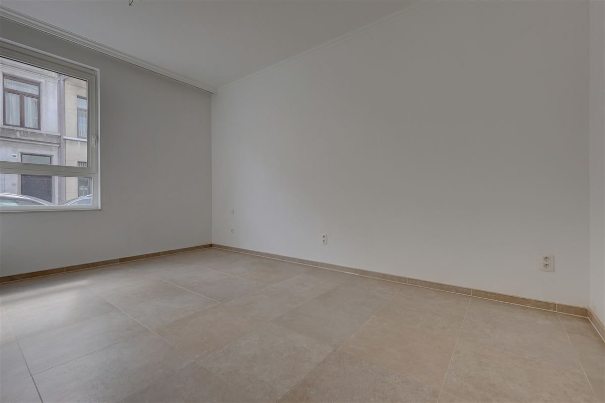 Lichtrijk appartement met 2 slaapkamers, staanplaats en gezellige tuin!