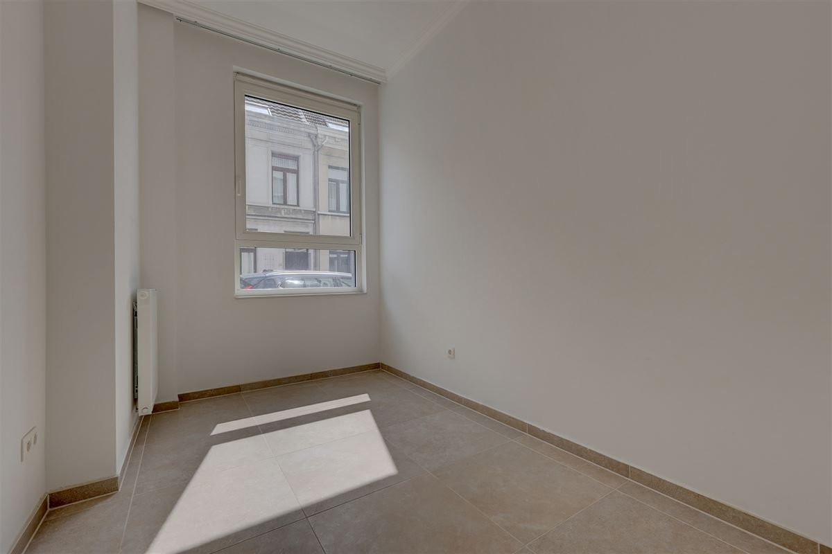 Lichtrijk appartement met 2 slaapkamers, staanplaats en gezellige tuin!