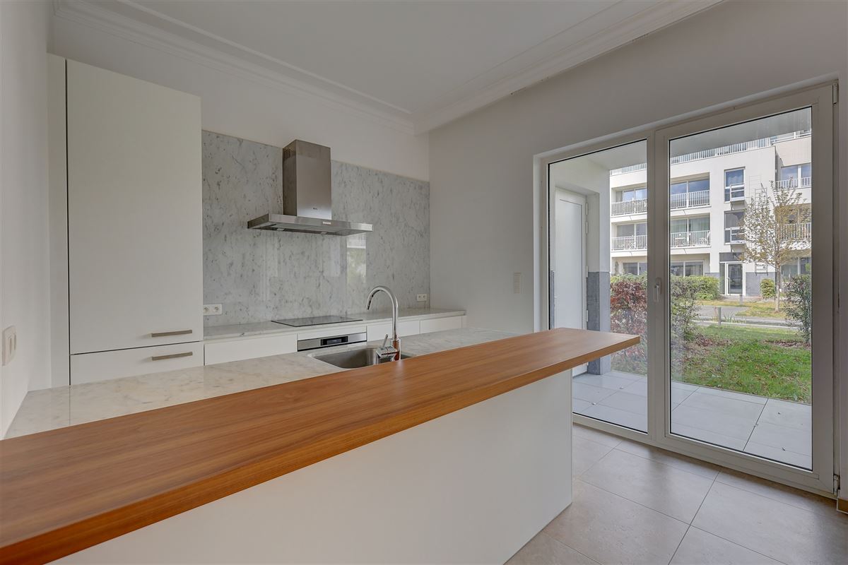 Lichtrijk appartement met 2 slaapkamers, staanplaats en gezellige tuin!