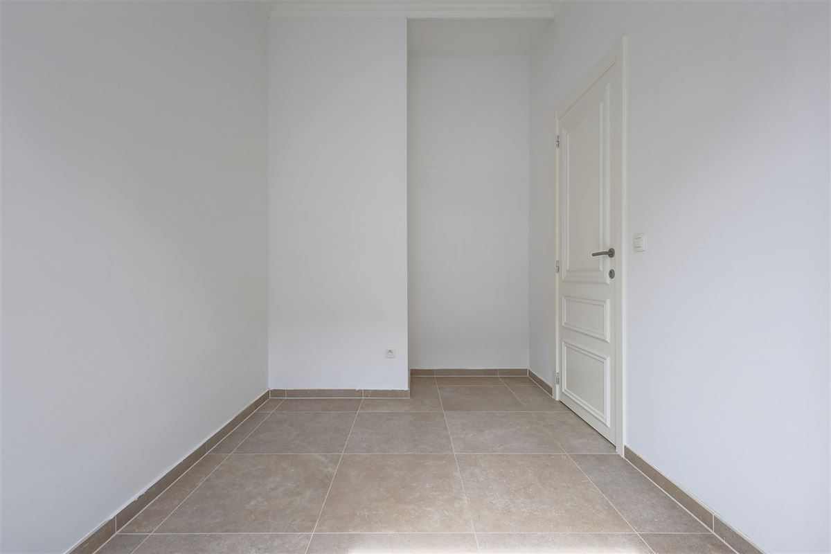 Lichtrijk appartement met 2 slaapkamers, staanplaats en gezellige tuin!