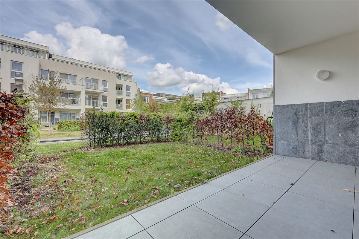 Lichtrijk appartement met 2 slaapkamers, staanplaats en gezellige tuin!