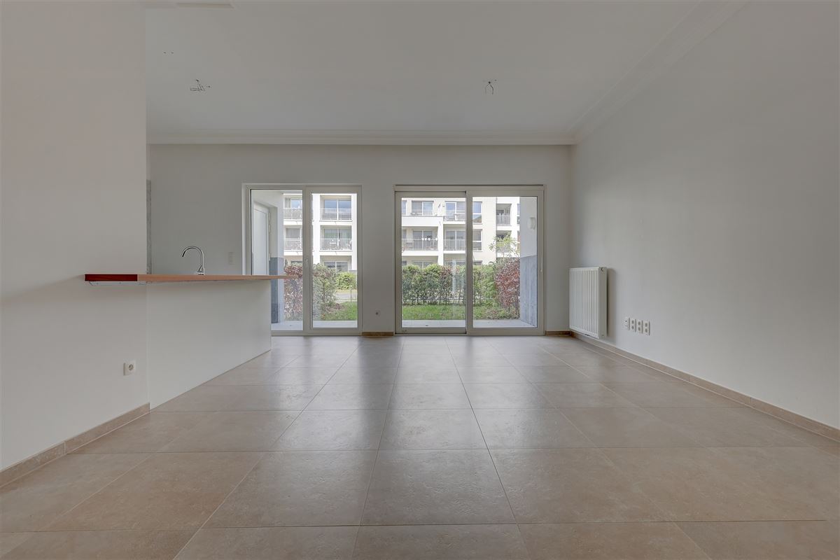 Lichtrijk appartement met 2 slaapkamers, staanplaats en gezellige tuin!