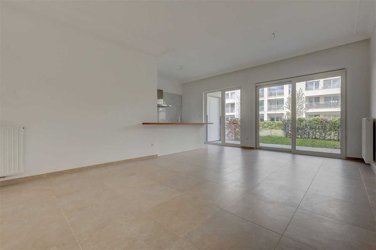 Lichtrijk appartement met 2 slaapkamers, staanplaats en gezellige tuin!