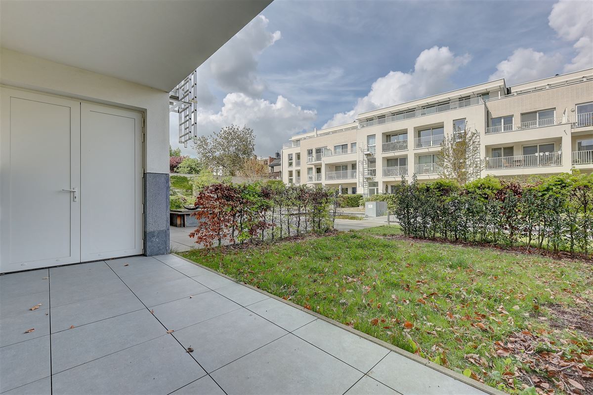 Lichtrijk appartement met 2 slaapkamers, staanplaats en gezellige tuin!