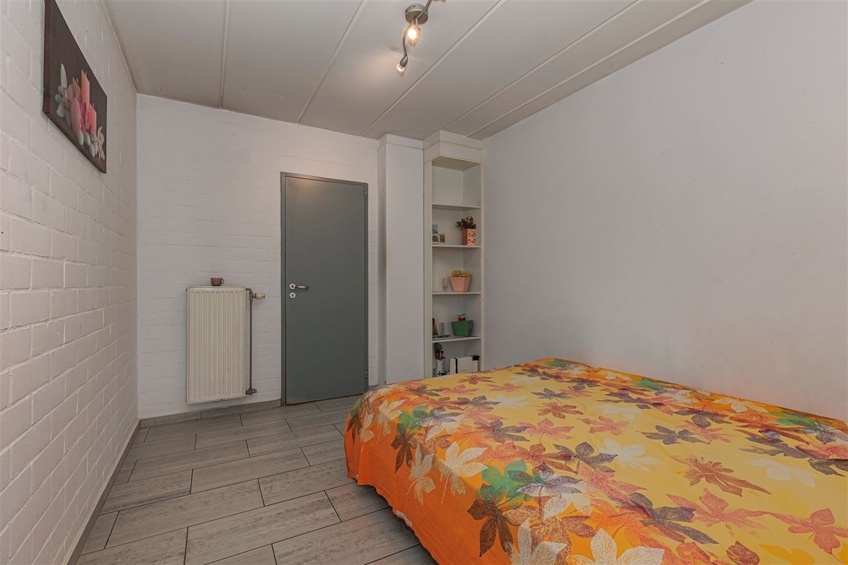 Lichtrijk 1-slaapkamer appartement met tuin en garagebox te koop in Merksem