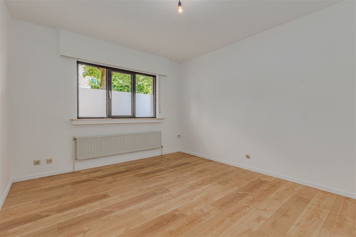 Instapklaar 2 slk appt met tuin en garagebox aan Te Boelaerpark