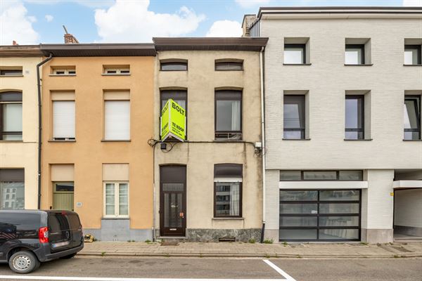 Te renoveren woning met tuin op toplocatie in Mechelen