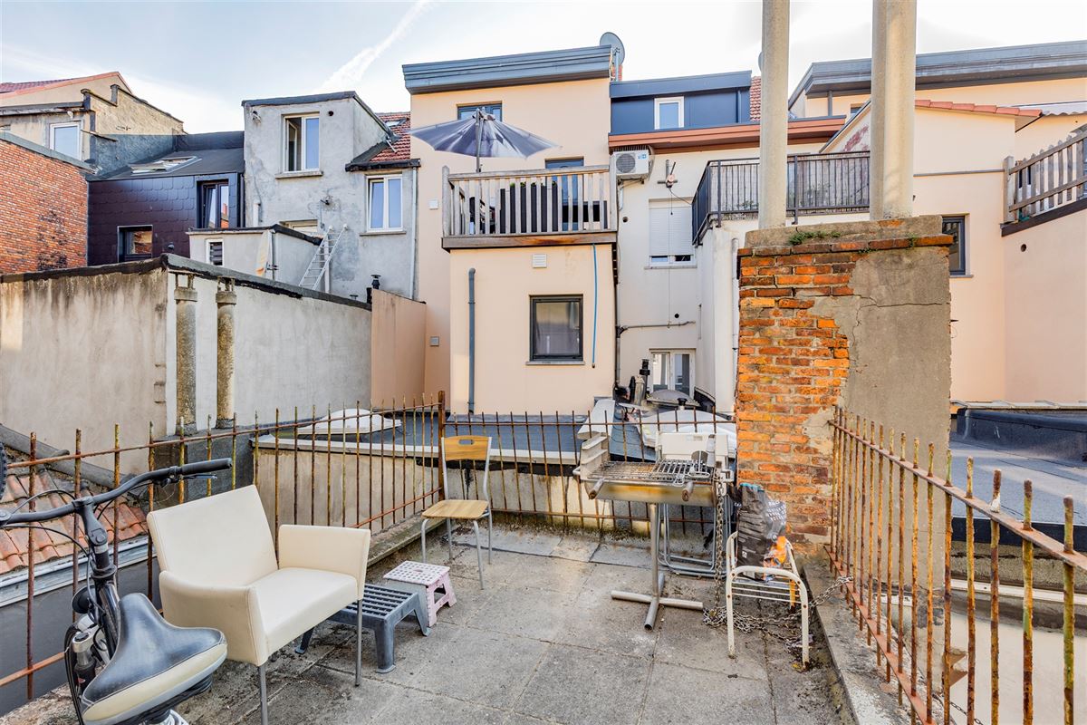 Woning met 4 verhuurde appartementen