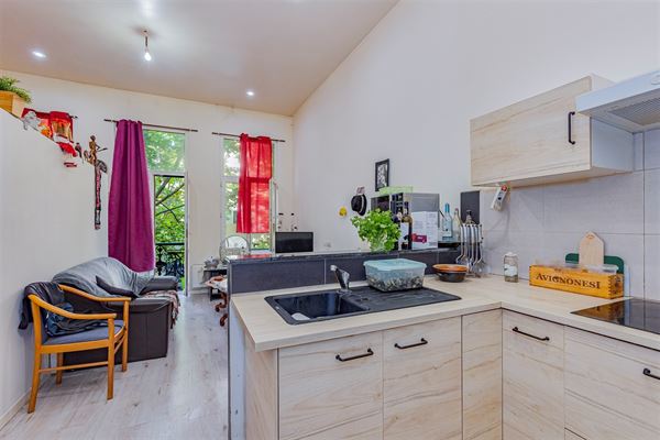 Woning met 4 verhuurde appartementen